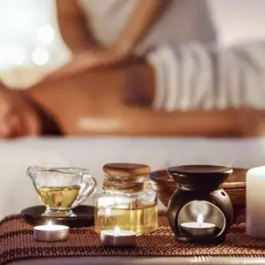 Relaxed woman enjoying aromatherapy massage in luxury spa