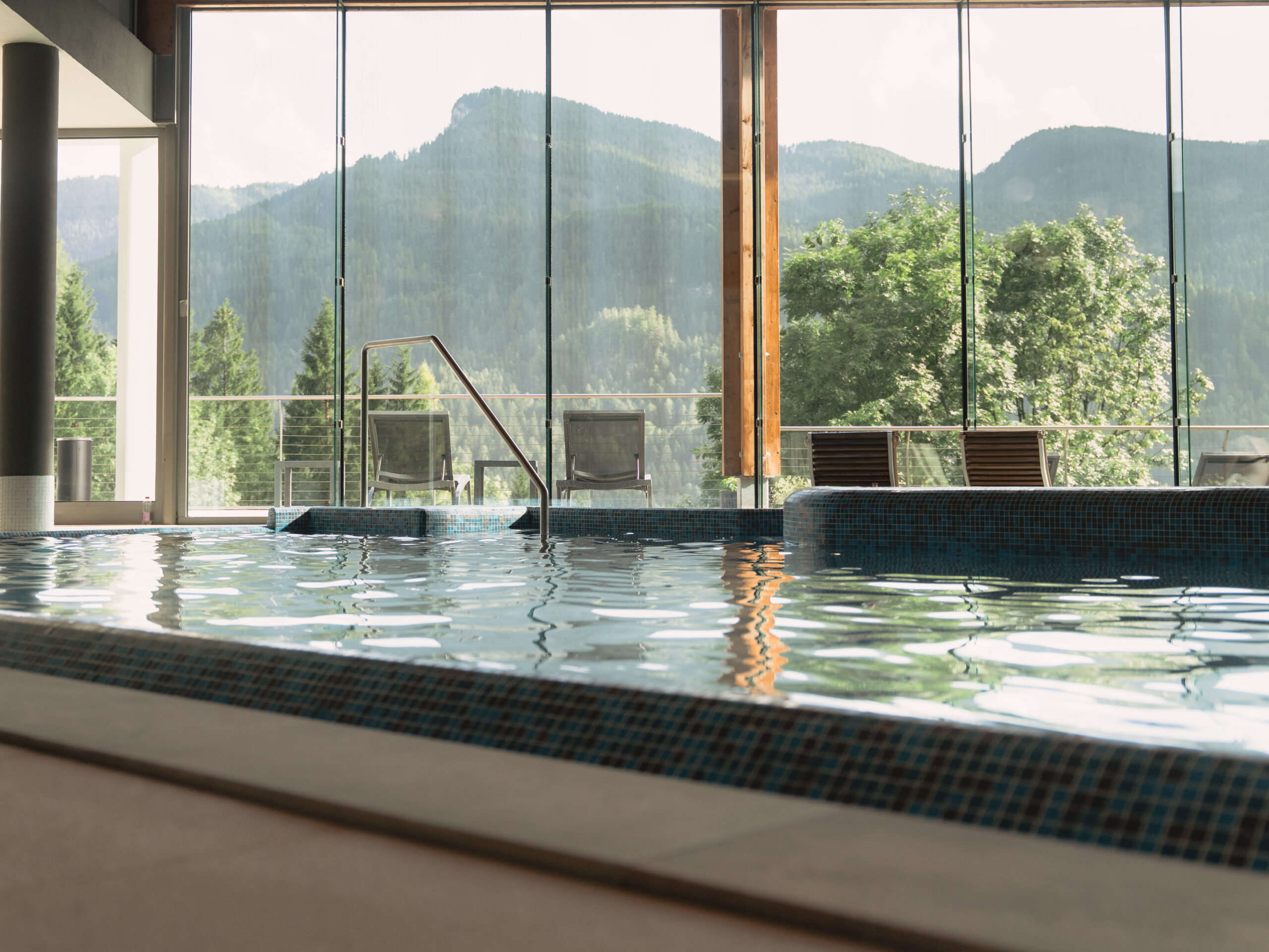 Indoor pool with mountain views at Corte Spa, Cadore Dolomiti